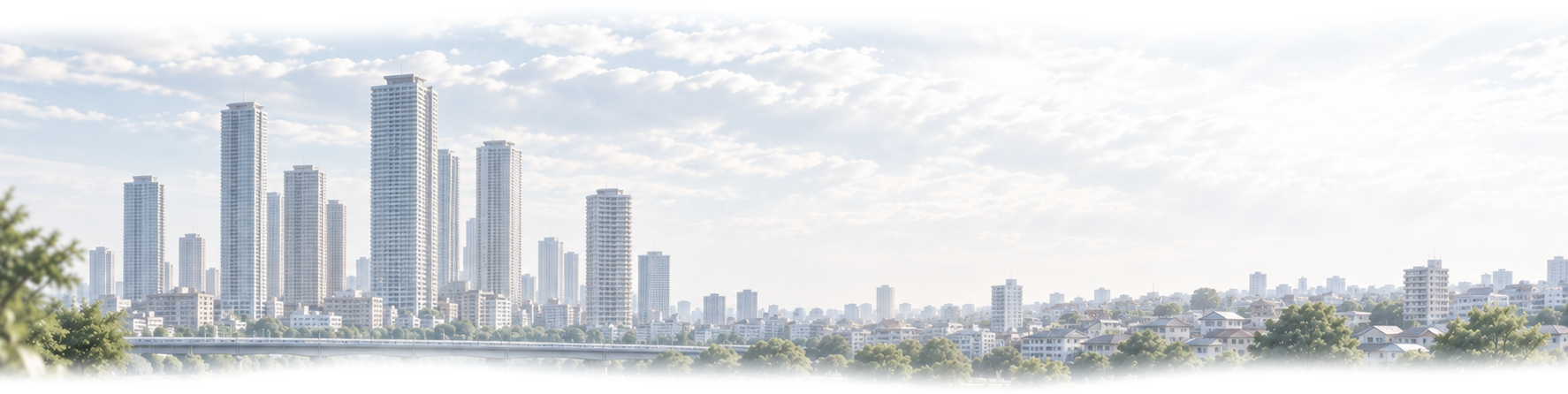 川の向こうに広がる高層ビル群と街並み